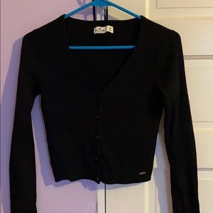 A black down button shirt from Hollister